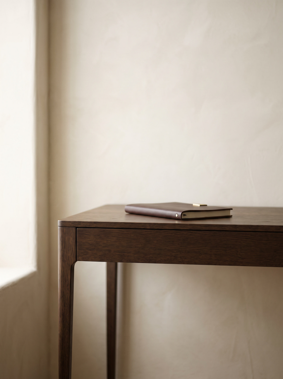 A dark oak writing desk