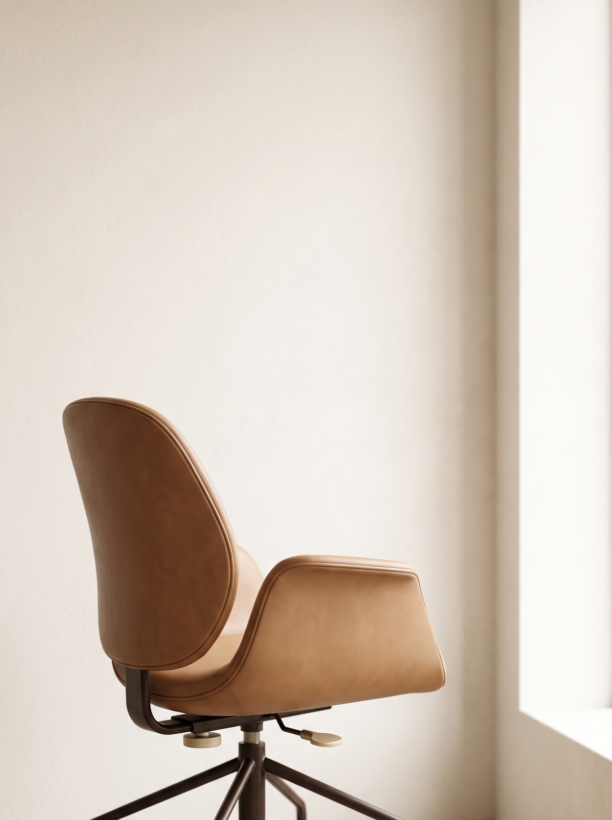 A tan leather office chair