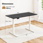 Electric standing desk raised to standing height