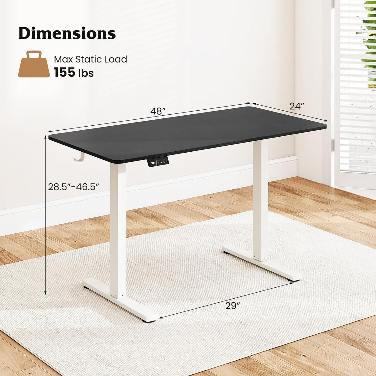 Electric standing desk raised to standing height