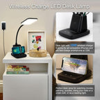 Black desk lamp with an integrated wireless charging pad and pen holder