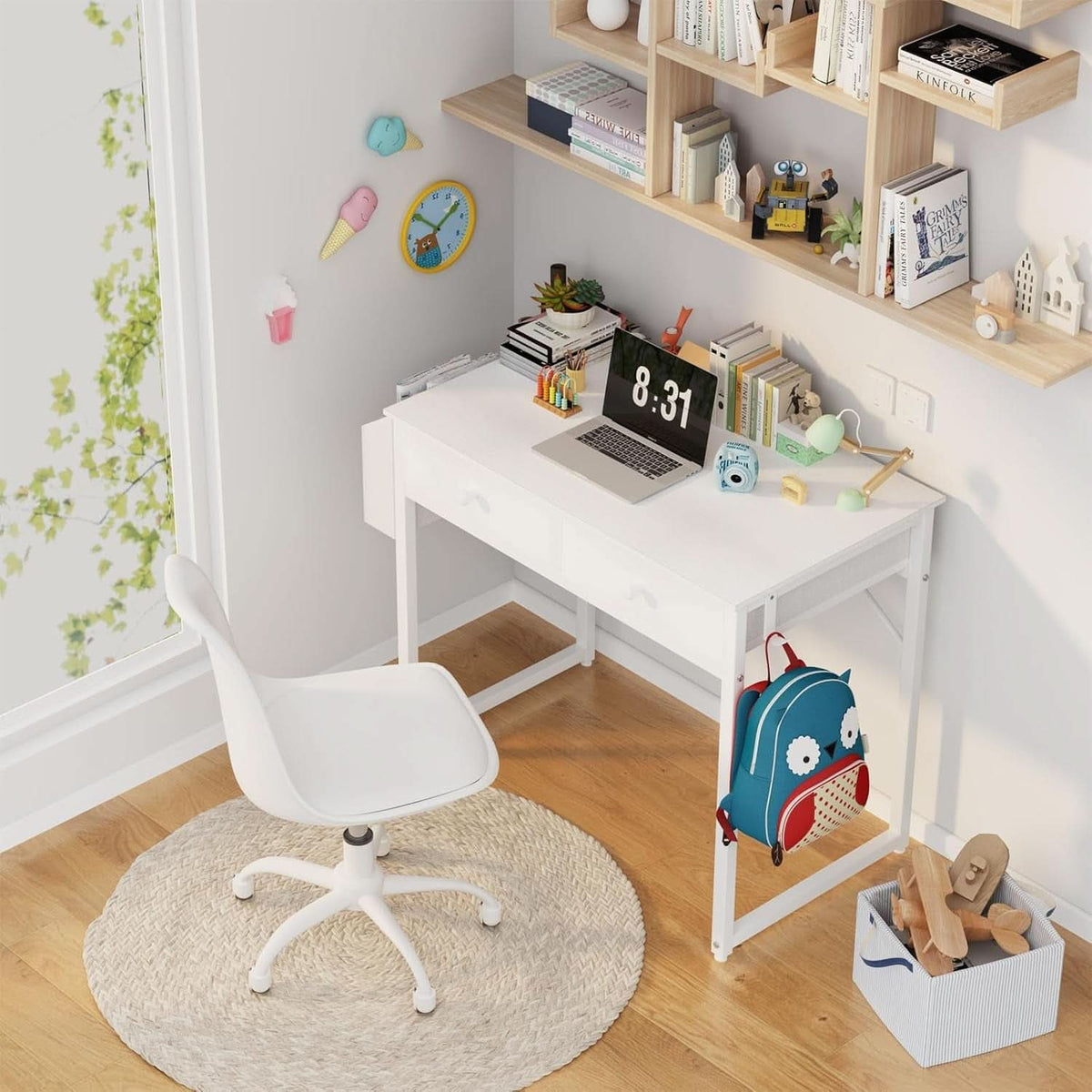 Compact white writing desk with a fabric storage drawer