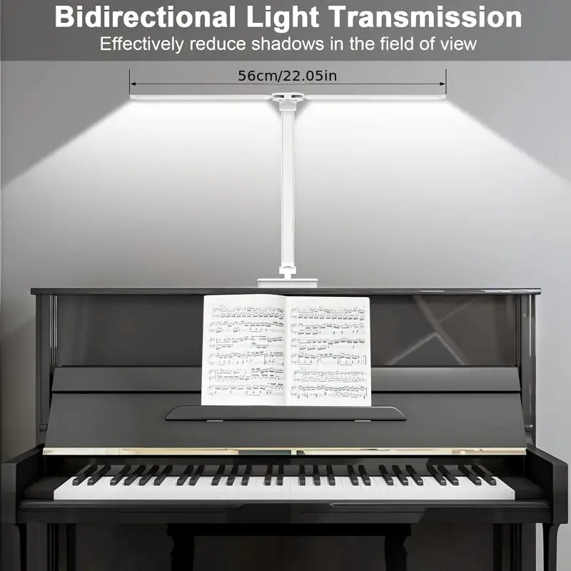 White double arm banker lamp folded over a desk
