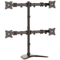 Articulating quad monitor stand in steel and aluminium holding four screens