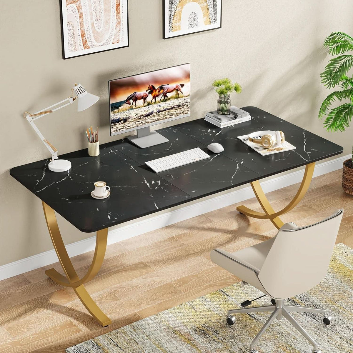 Black executive desk with brass toned detailing
