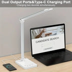 White double arm banker lamp folded over a desk