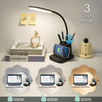 Black desk lamp with an integrated wireless charging pad and pen holder