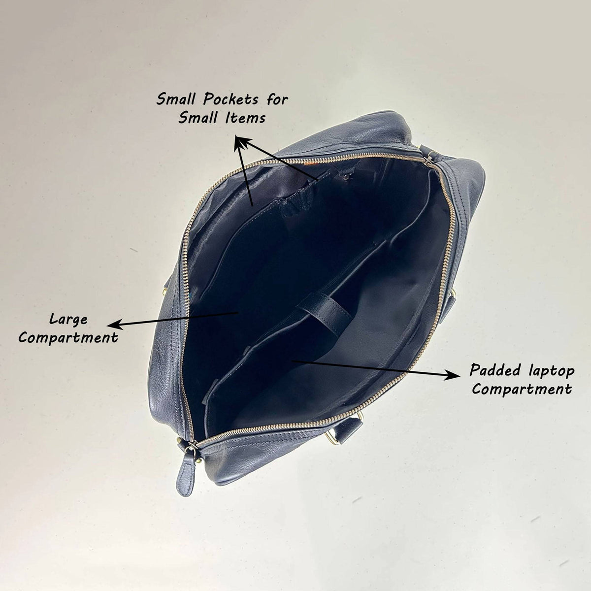 Black full grain leather messenger bag with a flap closure