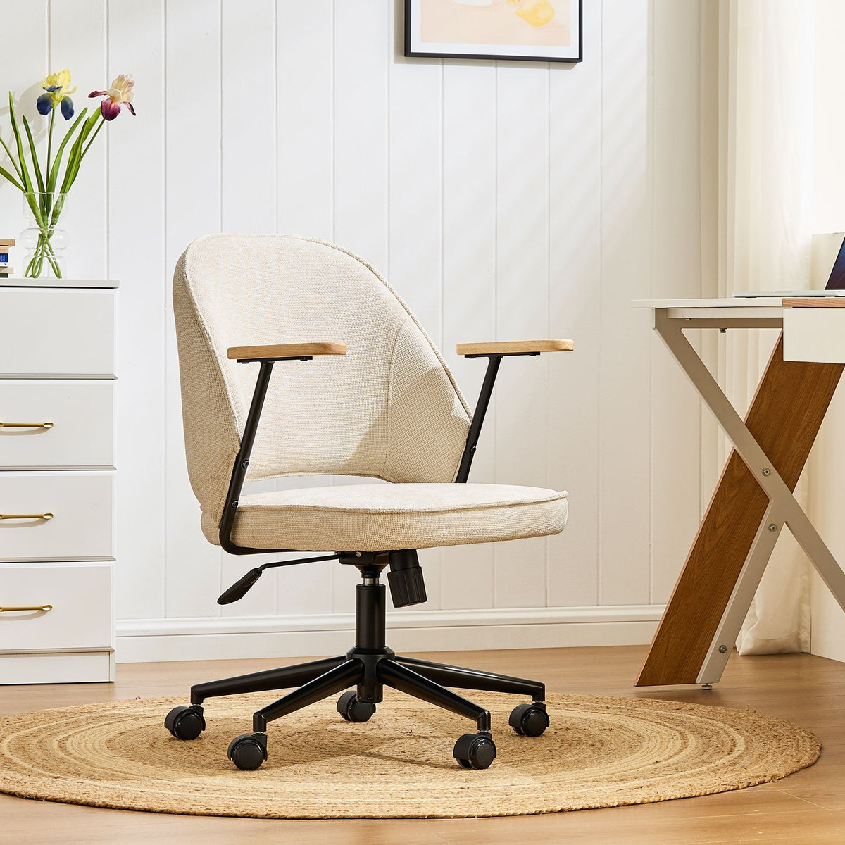 Upholstered rolling office chair on castors
