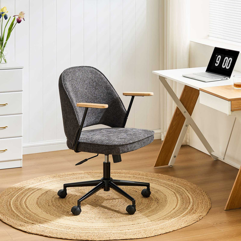 Upholstered rolling office chair on castors