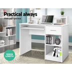 White desk with a slide out keyboard tray and open shelving