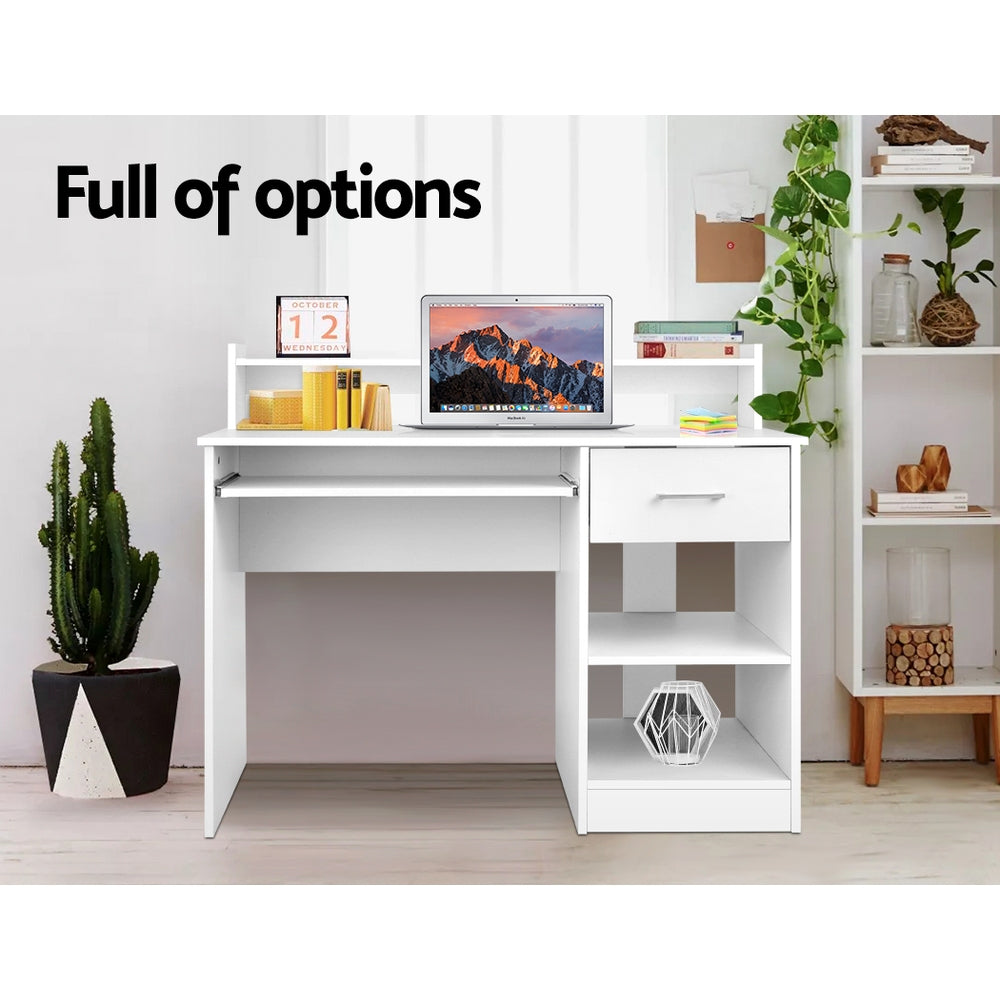 White desk with a slide out keyboard tray and open shelving