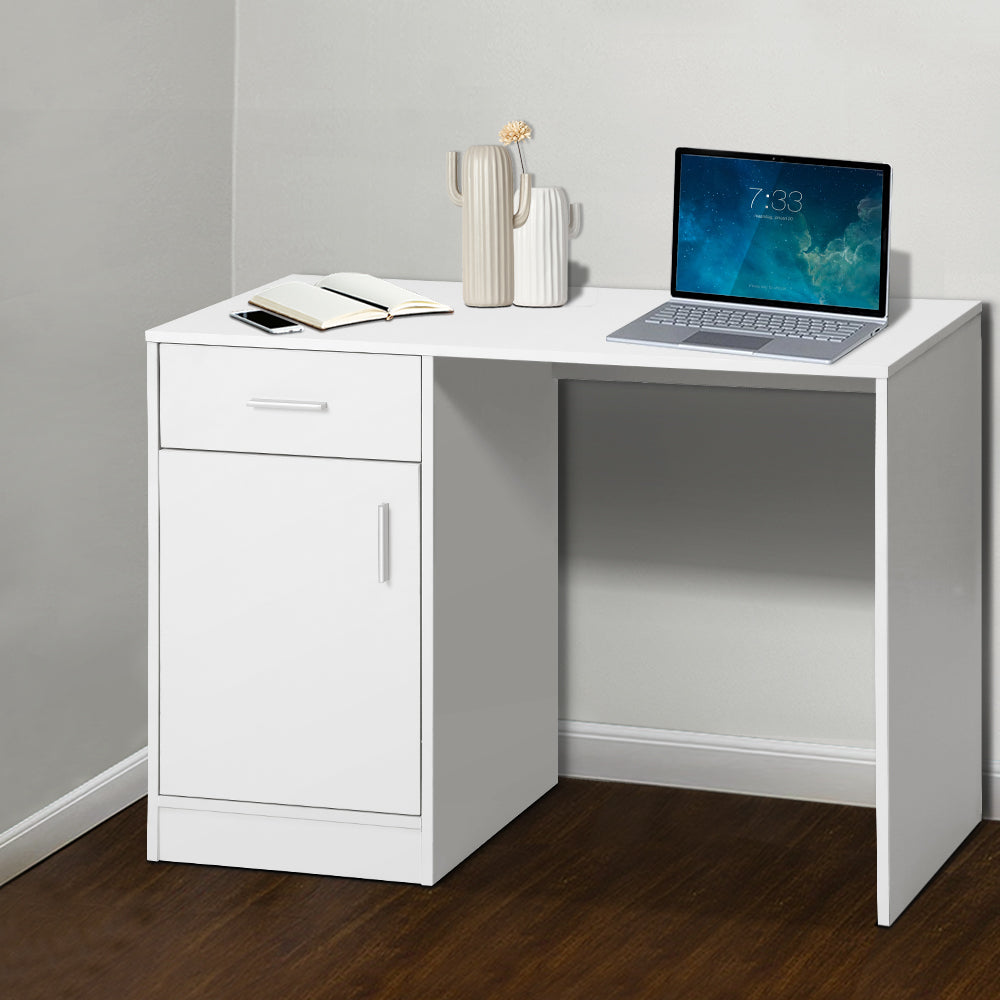 Small white desk with a sliding drawer and a closed cabinet