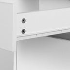 White desk with an open bookshelf and a closed storage cabinet