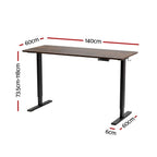 Height adjustable standing desk with a rustic brown top and black frame