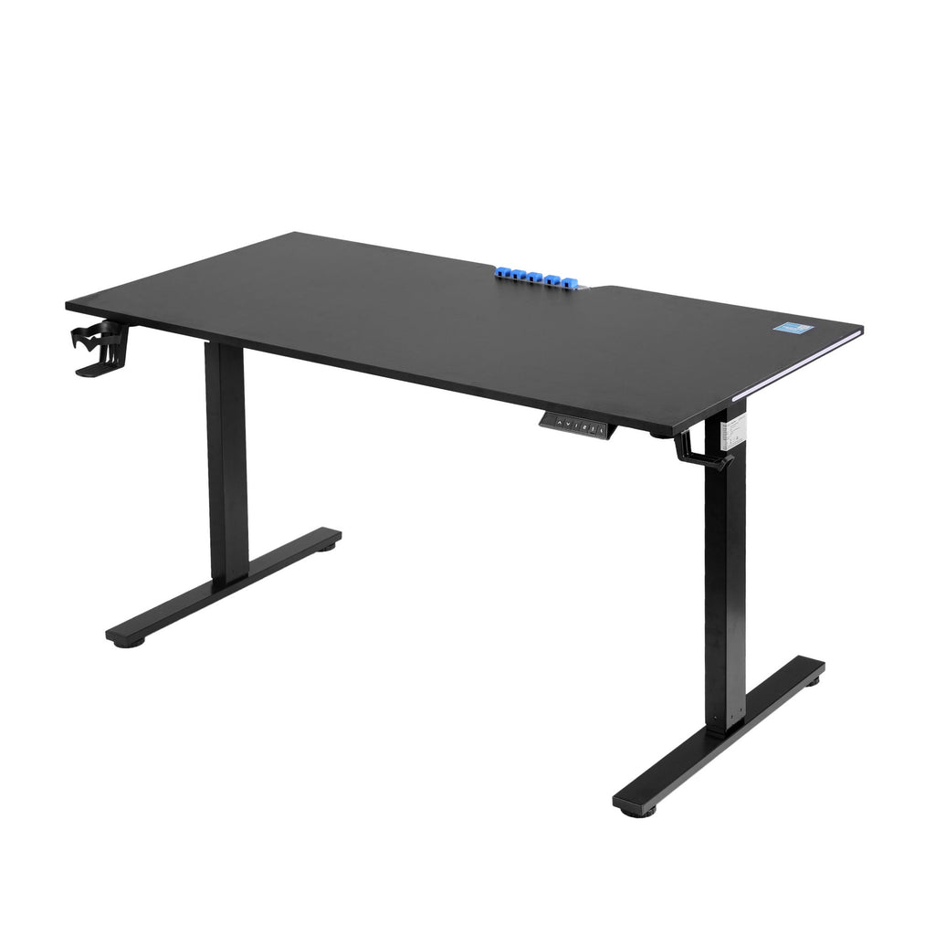 Black electric standing desk at standing height