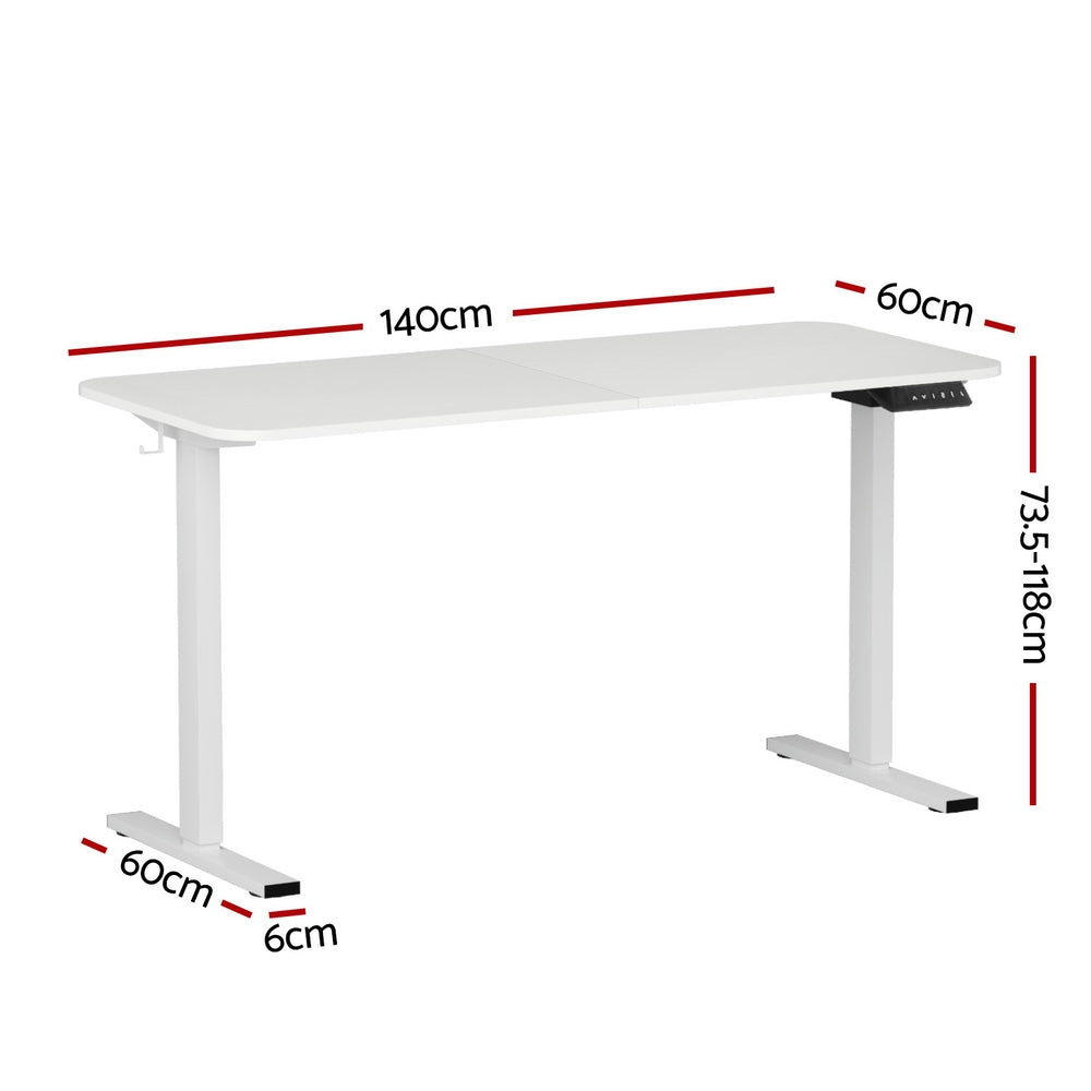 White electric standing desk raised to standing height