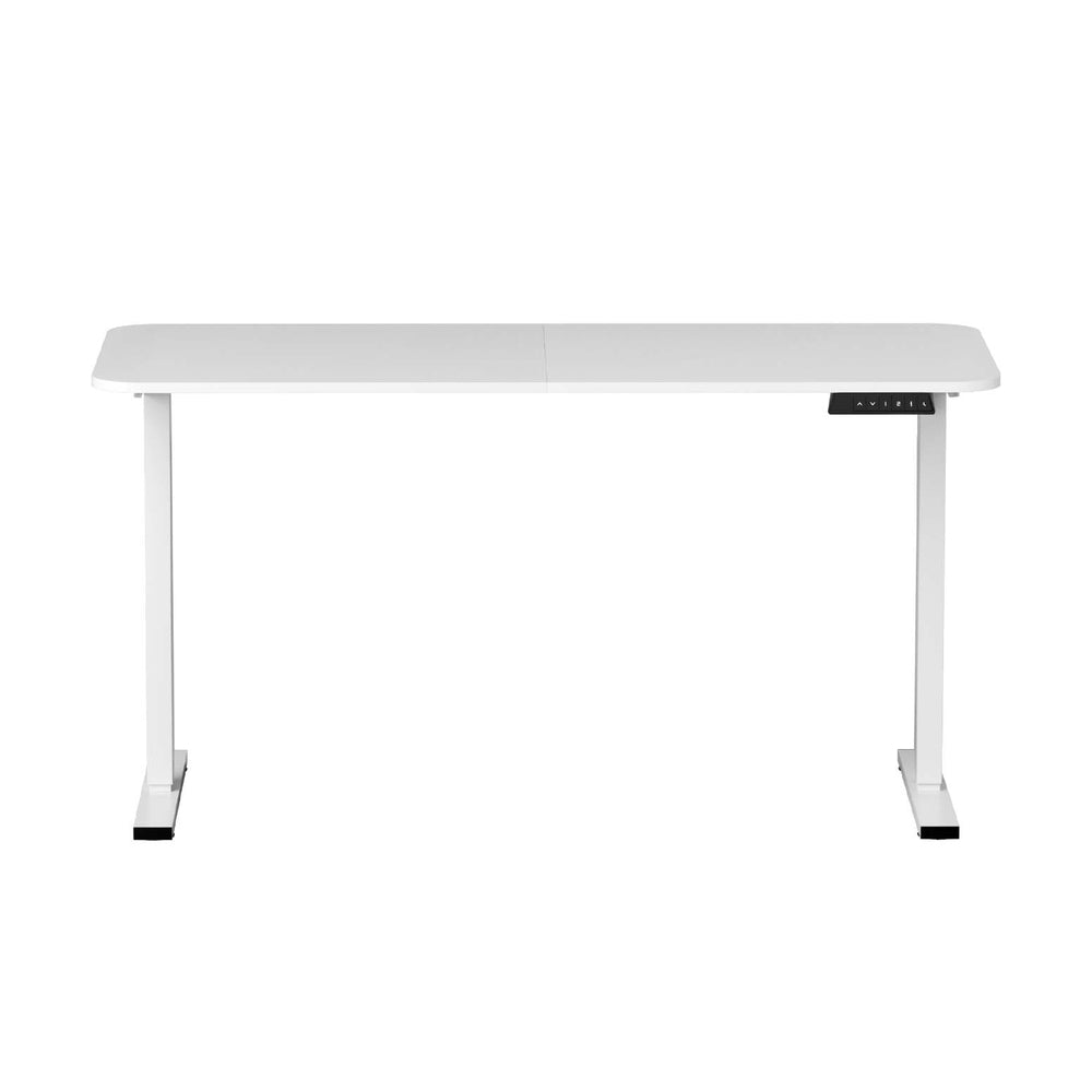 White electric standing desk raised to standing height