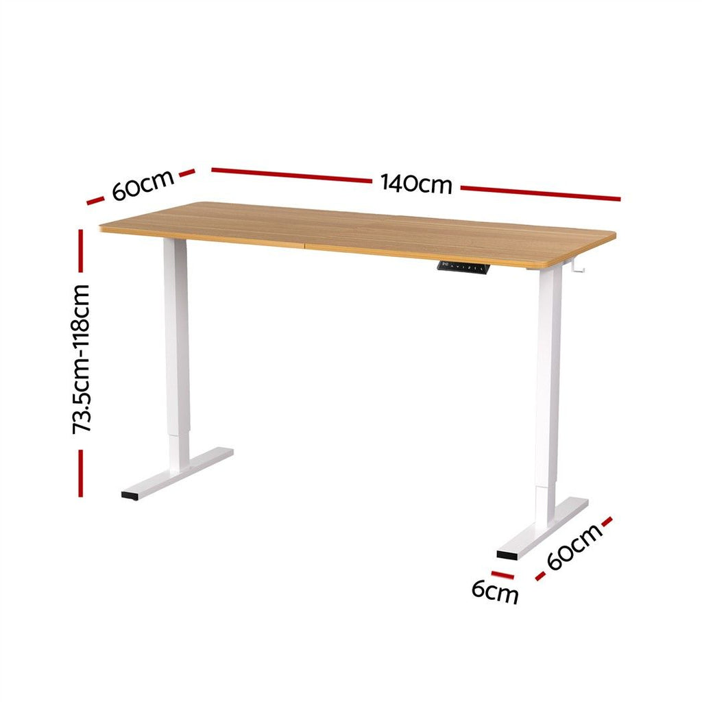 Height adjustable standing desk with an oak top and white frame