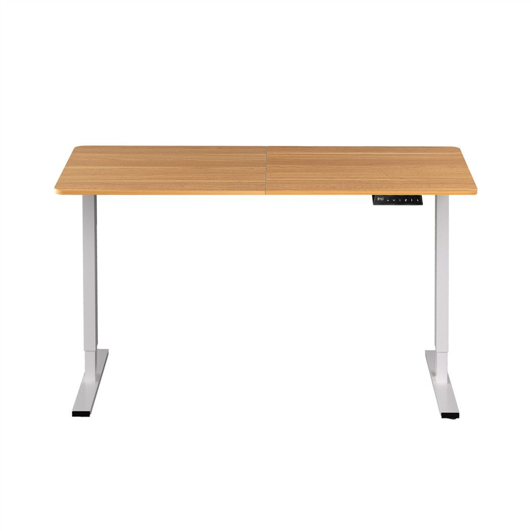 Height adjustable standing desk with an oak top and white frame