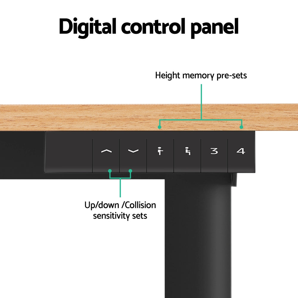 Electric sit stand desk with a natural wood top raised to standing height