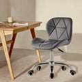 Grey swivel office chair on chrome legs with castors