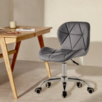 Grey swivel office chair on chrome legs with castors