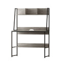 Grey steel workstation desk with a partitioned shelf above the work surface
