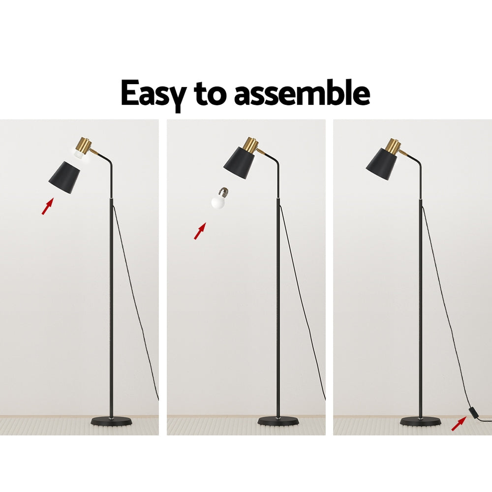 Slim black floor lamp with a metal frame and weighted base