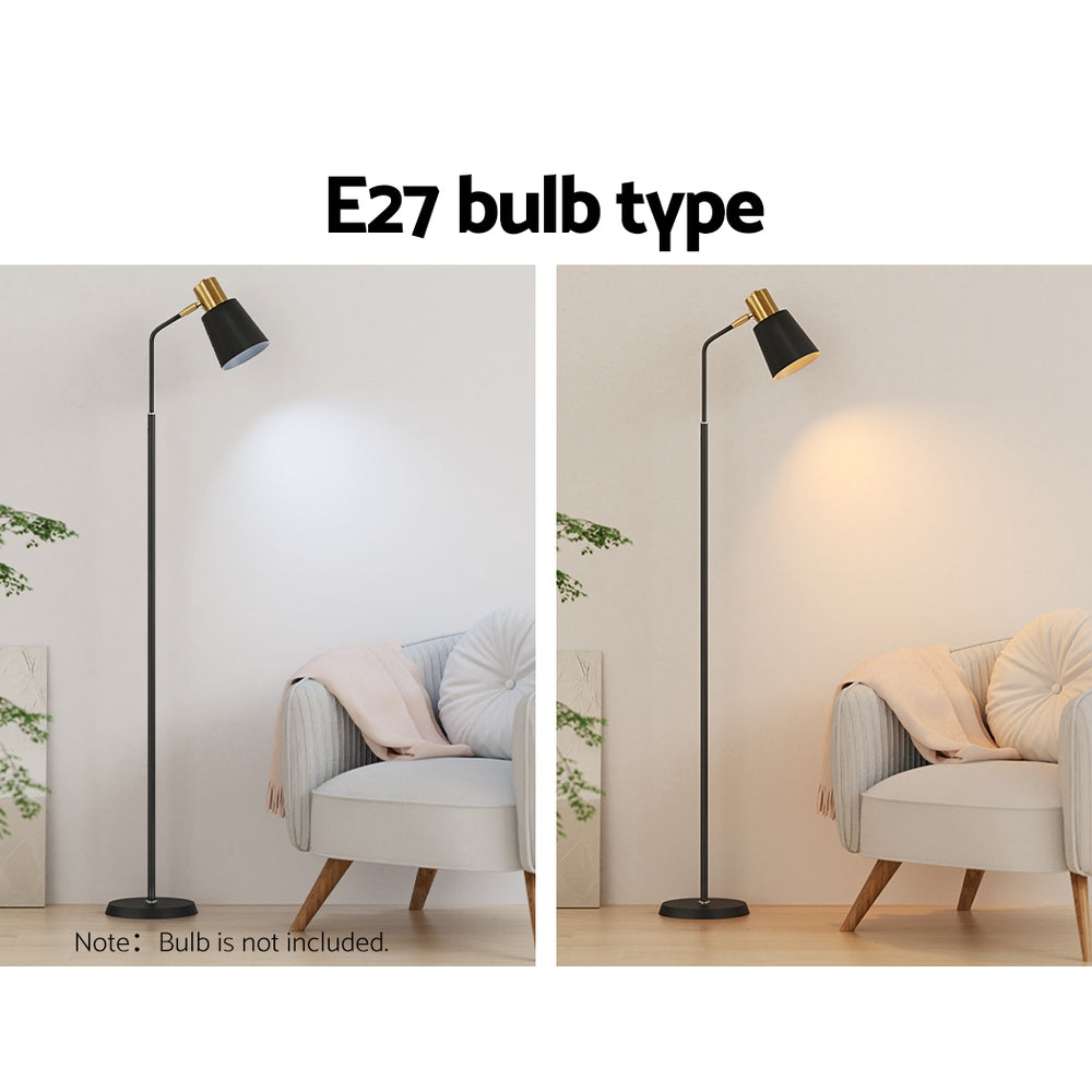 Slim black floor lamp with a metal frame and weighted base