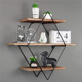 Wooden floating wall shelves with a worn timber finish