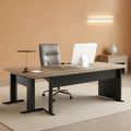 Grey L shaped executive desk with a three drawer file cabinet