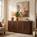 Fluted Walnut Sideboard with Adjustable Shelves — against a wall in a living room
