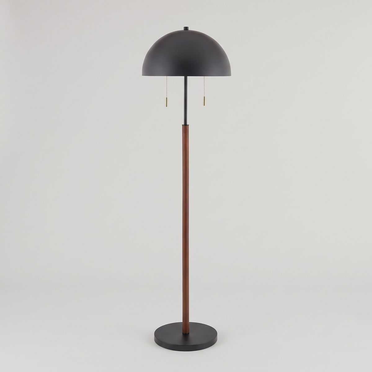 Black iron two-light floor lamp, studio product shot