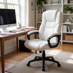White high-back executive office chair beside a desk in a bright home office