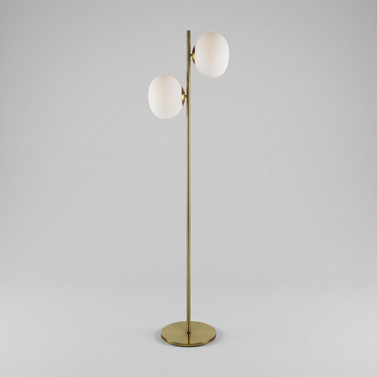 Brass and white glass two-light floor lamp, studio product shot