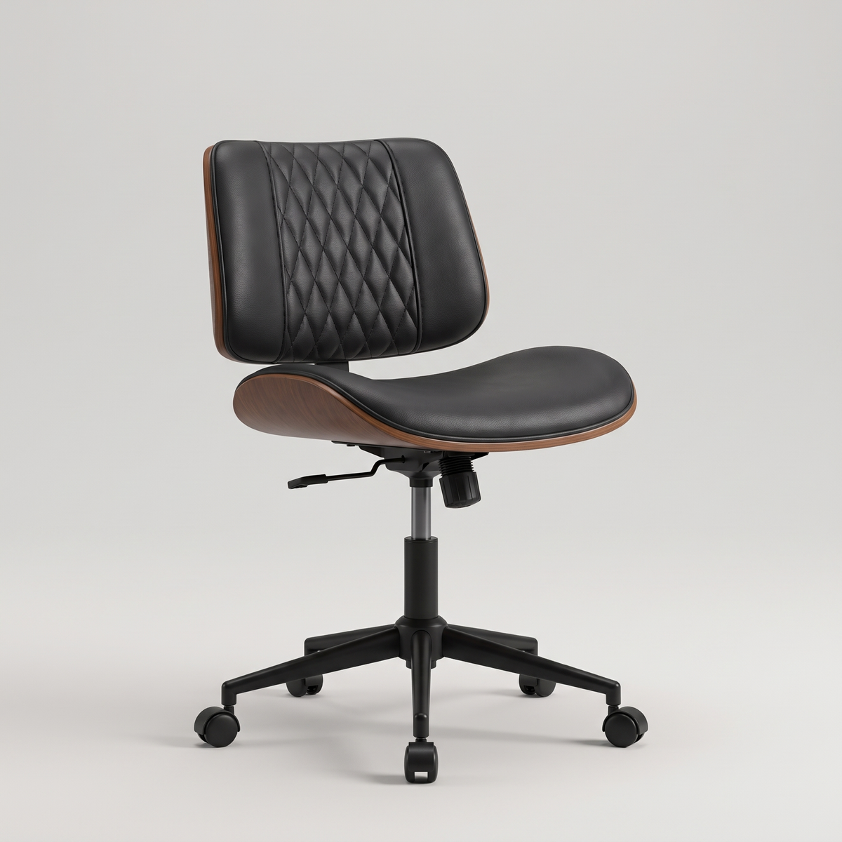 Armless PU leather swivel desk chair, studio product shot