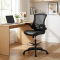 Black mid-back mesh office chair with flip-up arms at a desk