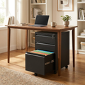 Three-drawer lockable steel rolling filing cabinet under a desk