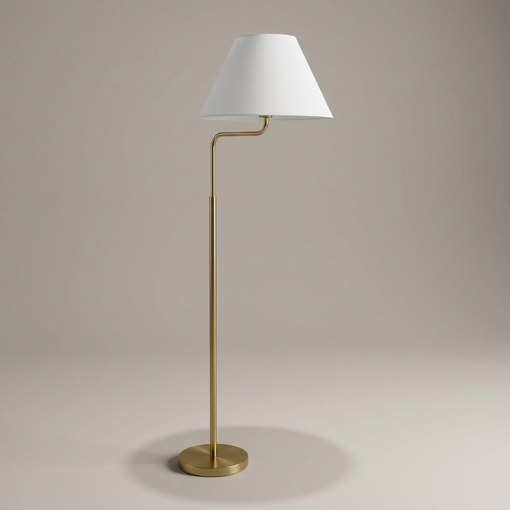 Brass-tone floor lamp with white shade, studio product shot