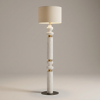 Gold-tone floor lamp with linen shade, studio product shot