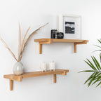 Pair of oak floating wall shelves with holders